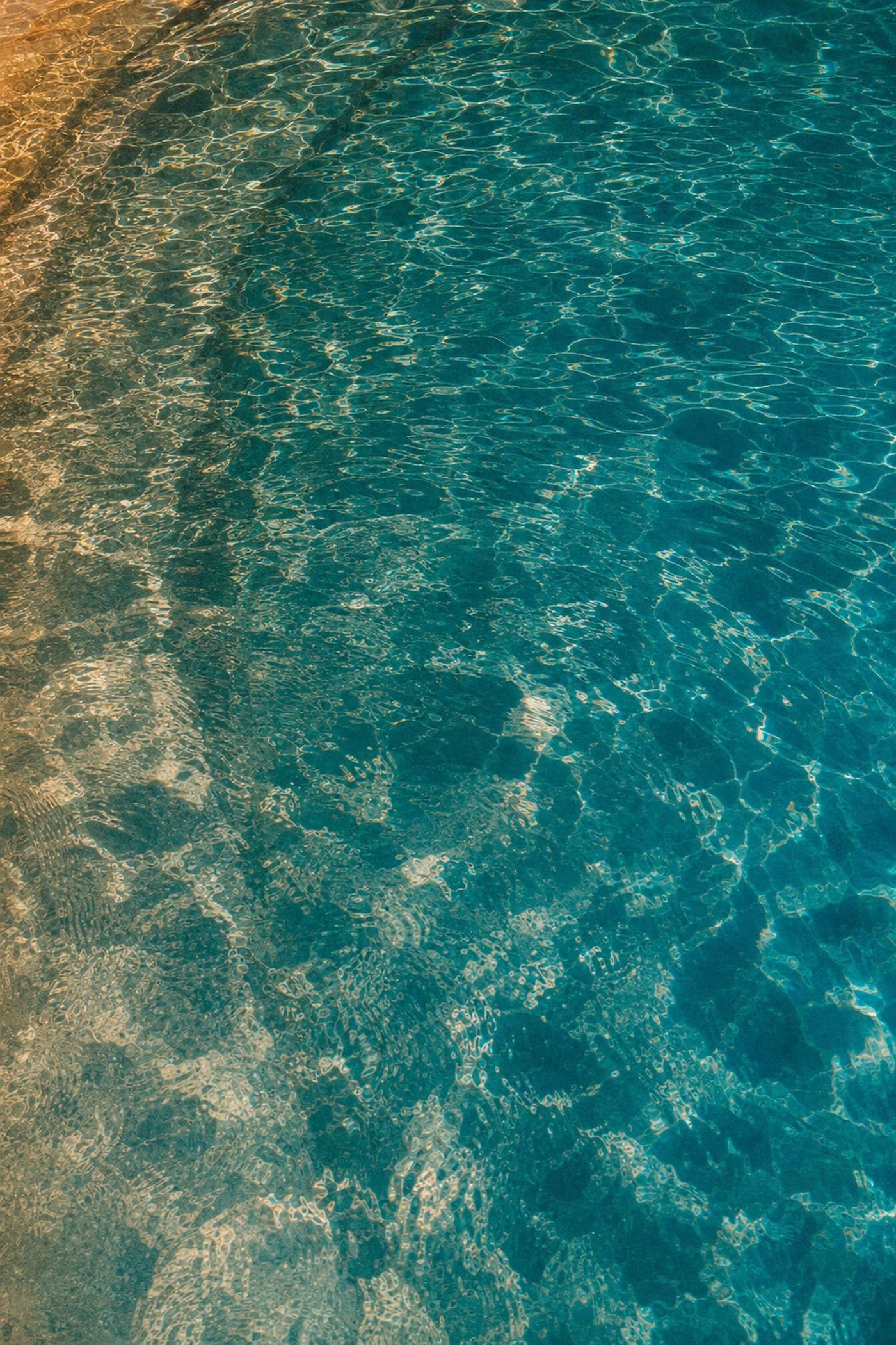 Photo attached to this visit: clear pool water surface.